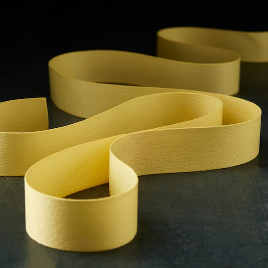 12 Pack: 7/8" x 5yd. Faux Suede Ribbon by Celebrate It™